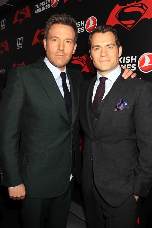 	BEN AFFLECK and HENRY CAVILL from Warner Bros. Pictures' action adventure 