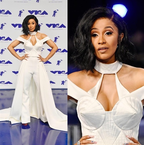 Cardi B, who has the hit song Bodak Yellow, glams up in Christian Siriano for the VMAs