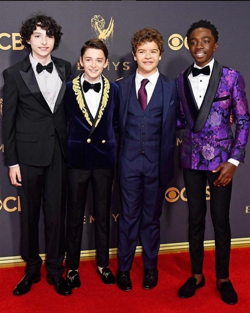 Finn Wolfhard in Prada, Noah Schnapp in Balmain, Gaten Matarazzo in Ted Baker and Caleb McLaughlin in Garcon Couture