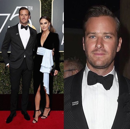 Armie Hammer in Armani alongside Elizabeth Chambers