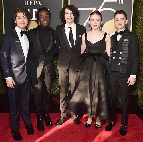 Gaten Matarazzo in Suit Supply, Caleb McLaughlin in Ports1961, Finn Wolfhard in Saint Laurent, Sadie Sink in MiuMiu, Noah Schnapp in Balmain