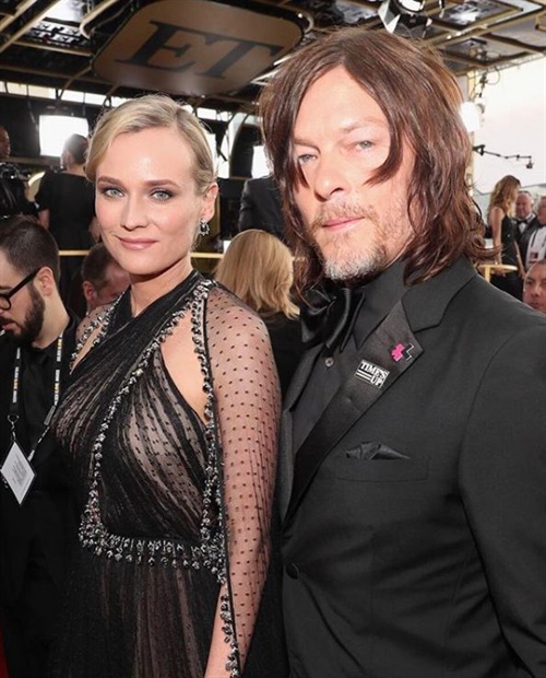 Picture perfect couple Diane Kruger and Norman Reedus both wear Prada