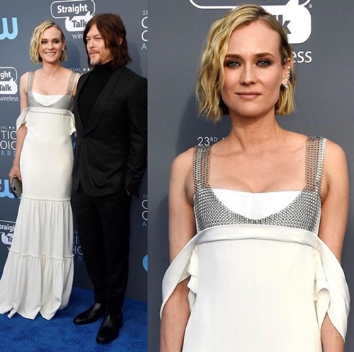 Diane Kruger in Vera Wang brings her fashion A-game alongside boyfriend Norman Reedus in Zegna