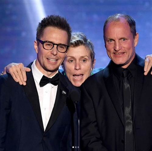 Frances McDormand in Valentino, Sam Rockwell in Prada