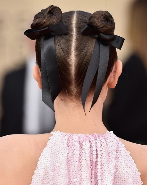 Millie Bobby Brown in Calvin Klein boldly rocks spacebuns