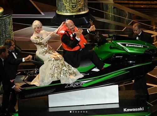 Host Jimmy Kimmel makes good on his word and awards Oscar-winning costume designer Mark Bridges a jet ski for having the shortest acceptance speech during the ceremony. Helen Mirren even rode in on the jet ski with Mark!