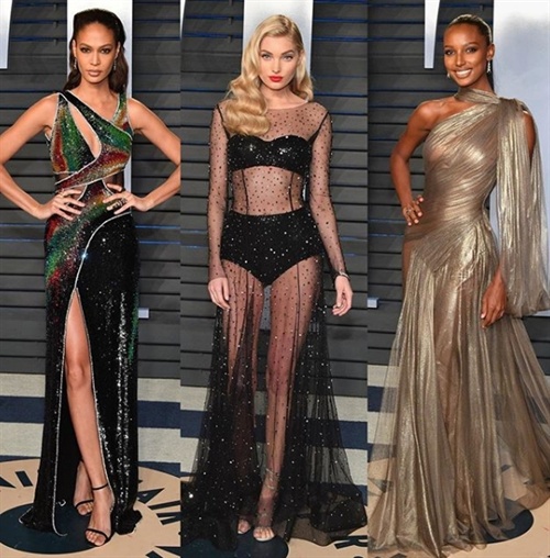 Joan Smalls in Alberta Ferretti, Elsa Hosk in Alberra Ferrerti and Jasmine Tookes in Jean Louis Sabaji