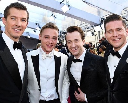 Ben Hardy in Armani, Joe Mazzello in Dsquared2, Allen Leech in Brioni, Gwilym Lee in Armani